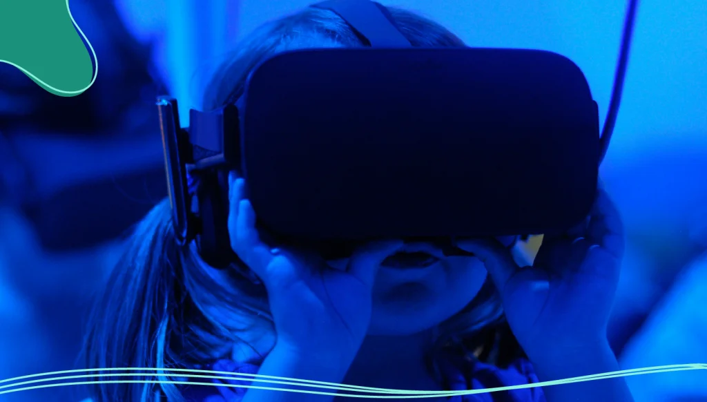 A girl using virtual reality goggles